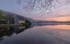Ireland-Cork-Gougane Barra Church and mountain reflections in lake Art Print